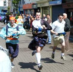 Three galloping bar men